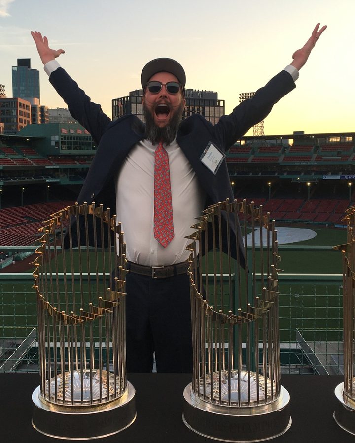 Charles Courtney with arms raised in celebration at Fenway Park